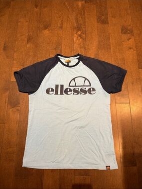 Ellesse Light Blue Tee with Navy Raglan Sleeves and Logo